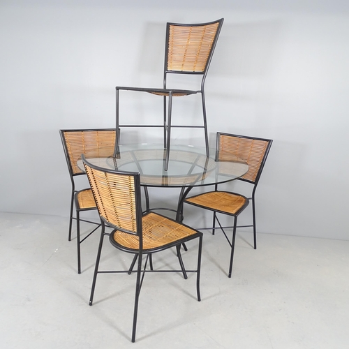 2559 - A mid-century design dining set in black painted metal and bamboo comprising circular table, 110x76c... 