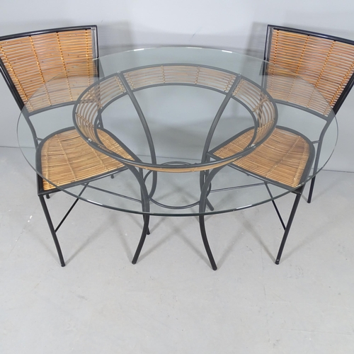 2559 - A mid-century design dining set in black painted metal and bamboo comprising circular table, 110x76c... 