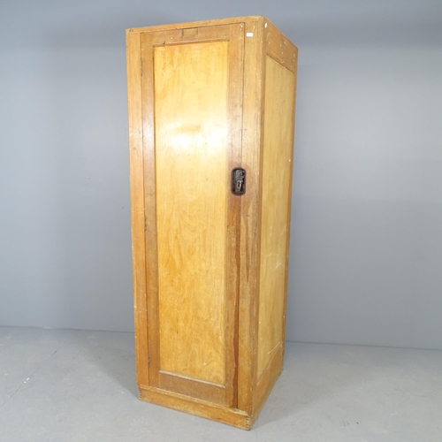 2561 - An early 20th century oak single door locker, with shelved interior. 60x172x58cm.