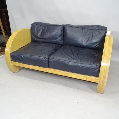 2576 - A contemporary craftsman made sofa in laminated birch of Art Deco style, with leather cushions and p... 