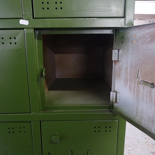 2579 - A vintage painted metal bank of 18 lockers. 91x198x50cm.