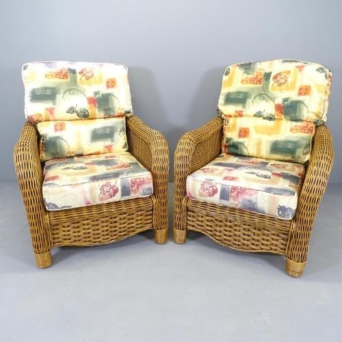 2584 - A modern wicker three-piece conservatory suite, comprising a two-seater sofa, 134x95x100cm, and two ... 