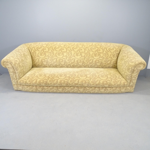 2585 - A modern cream three seater sofa with acanthus design. 230x78x90cm. Lacking front feet.