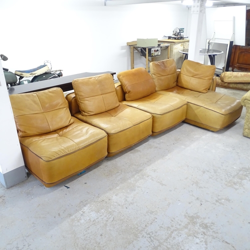 2586 - A modern modular four-section leather corner sofa. Overall 340x68x155cm in configuration as photogra... 