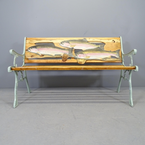 2589 - A teak slatted garden bench with cast iron ends, and painted Fish decoration, by Clive Fredriksson. ... 