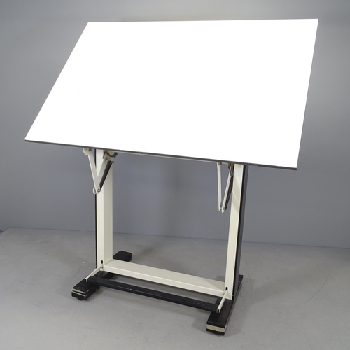 2599 - A vintage tilting drafting table on metal frame. (folded flat) 150x122x100cm. Max standing height 19... 