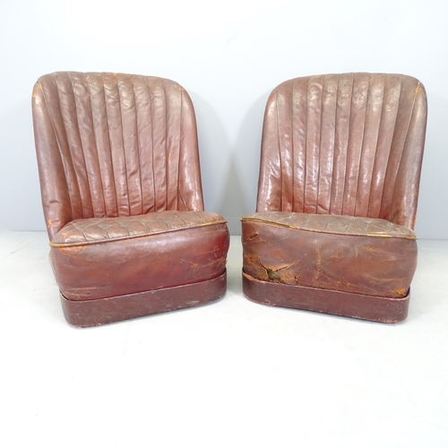 2600 - A pair of vintage red leather-upholstered car seats. Overall 56x70x75cm.