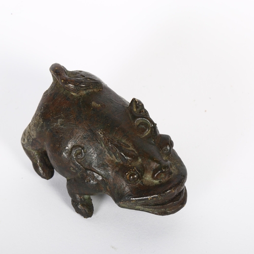 112 - A patinated bronze study of a mythical beast, L9cm