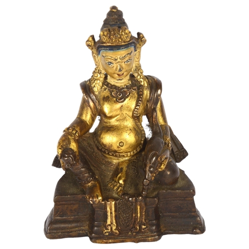 123 - A small Tibetan patinated bronze Jambhala, H9cm