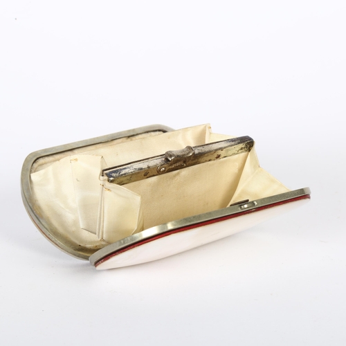 125 - An early 20th century lady's mother-of-pearl purse, with figural relief carved panel, L9cm