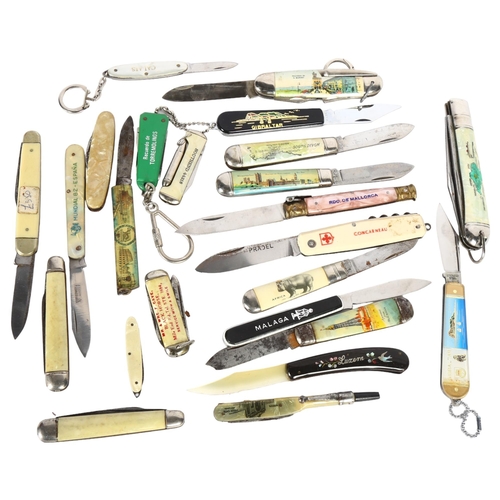 129 - A collection of folding pocket knives, all place named, including the Isle of Wight, Black Horse Pub... 