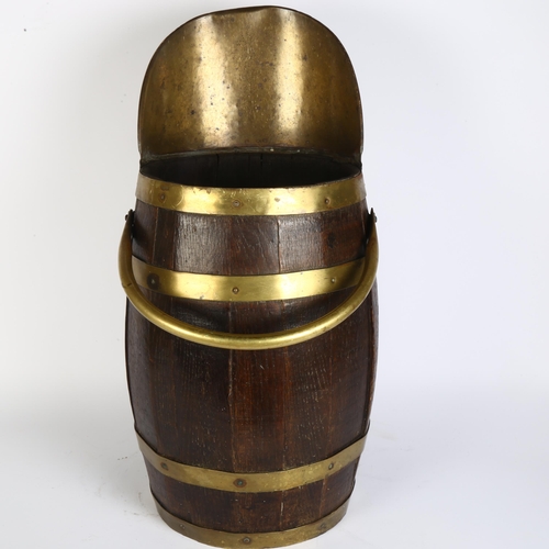 13 - A Victorian brass coopered oak coal bucket with brass handles, H56cm