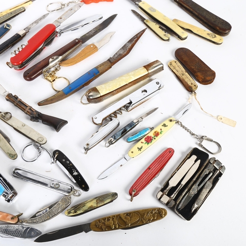 130 - A large collection of various penknives, including novelty