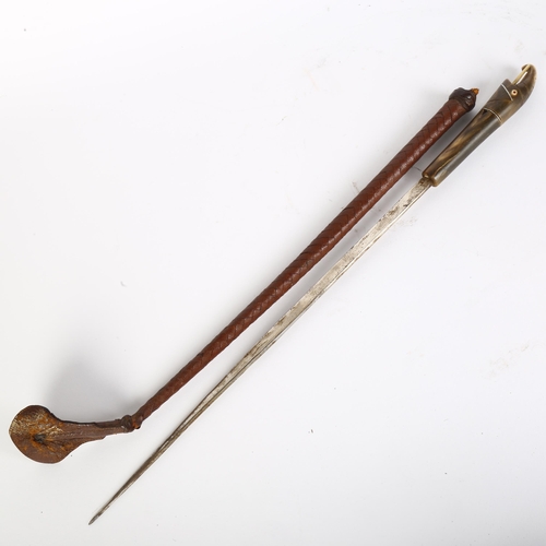 14 - An early 20th century swagger sword stick, a 32.5cm plain blade with no maker's marks, with a carved... 
