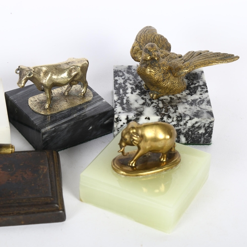 160 - 5 various desk paperweights, including an elephant on alabaster base, a clenched fist, an eagle etc ... 