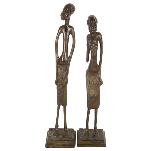 163 - A pair of African patinated brass figures, tallest 29cm