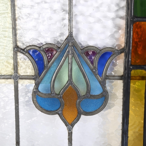 22 - 2 coloured leadlight glass panels, 1 decorated with flowers, the other in Art Nouveau style, largest... 