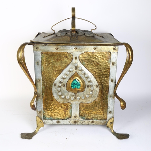 39 - An Arts and Crafts brass and pressed metal square-section coal box and cover, the stylised panels in... 