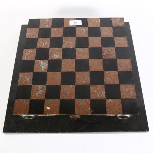 54 - A painted metal chessboard on scrolled frame and marble base, overall width 38cm