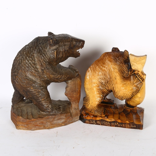 79 - 2 similar Hokkaido style carved bear sculptures, both with salmon, tallest 32cm (2)