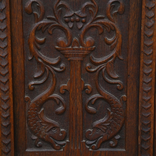 93 - An Antique Carolean style carved oak panel, H77cm