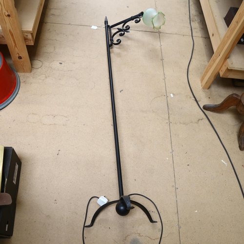 94 - A wrought-iron standard lamp, with adjustable shade, H160cm