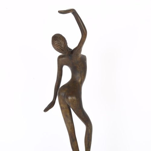 200 - A patinated spelter study of a female dancer, on turned wood stand, overall height 47cm