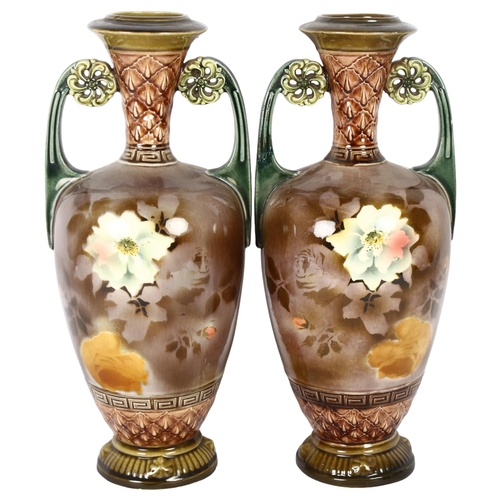 222 - A pair of Continental glazed 2-handled vases, incised marks to the base H32cm