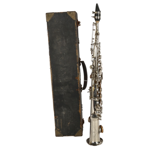 266 - A Soprillo saxophone made by La Lutherie Francaise of Paris, in what appears to be an associated har... 