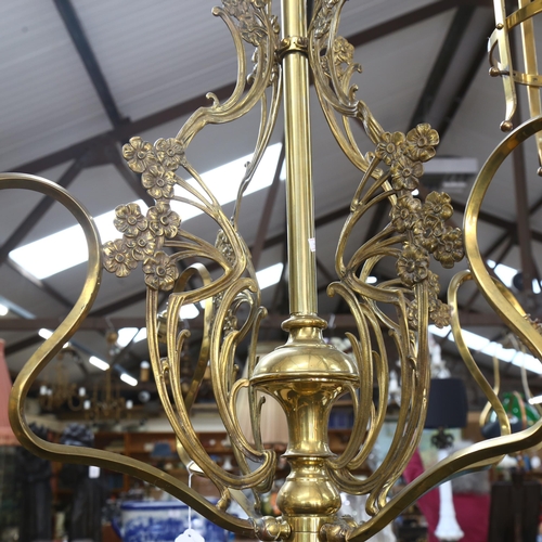 275 - A 4-branch brass ceiling light fitting, with floral decoration, drop 82cm