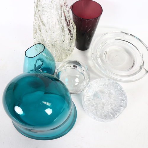 297 - A quantity of Studio Art glass, including a Kosta Boda? ash glass ashtray, diameter 22cm, an ice bar... 