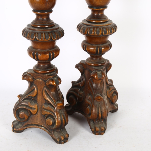 301 - A pair of stained wood Italian style candle stands, H40cm (2)