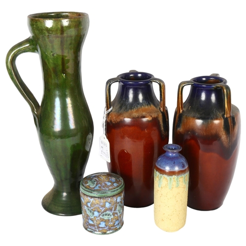 319 - A quantity of Studio pottery, including a tall green drip lava style jug, H33cm, a blue Studio potte... 