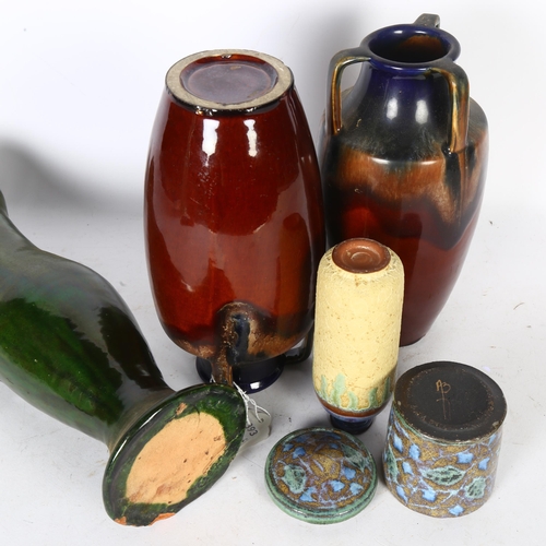 319 - A quantity of Studio pottery, including a tall green drip lava style jug, H33cm, a blue Studio potte... 