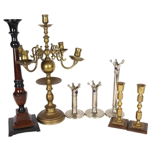 335 - A quantity of various candlesticks and candelabras, including a large 4-branch brass candelabra, H45... 