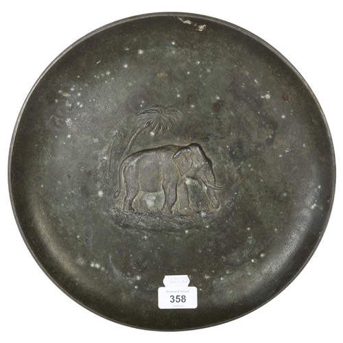 358 - A patinated bronze plate with African elephant embossed decoration, diameter 30cm