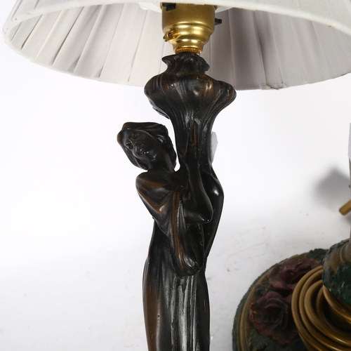 366 - A resin table lamp in the form of a female figure, and a larger
wooden table lamp, painted with flor... 