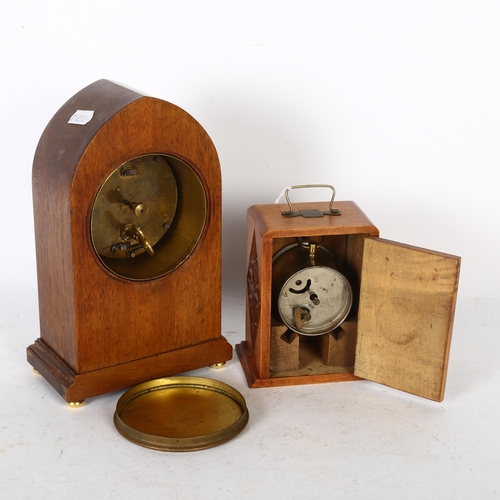 370 - An Edwardian mahogany lancet-top mantel clock, H22cm, and another (2)