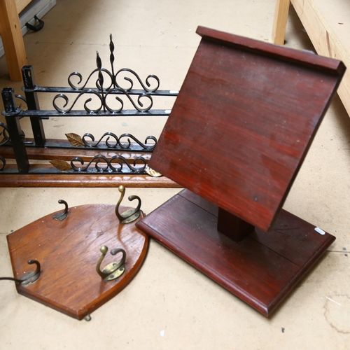 378 - A Masonic Lodge book rest, coat hooks on plaque (A/F), and a pair of wrought-iron on oak brackets, 7... 