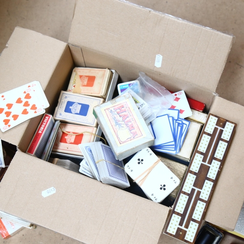 381 - A box with playing cards, crib board etc