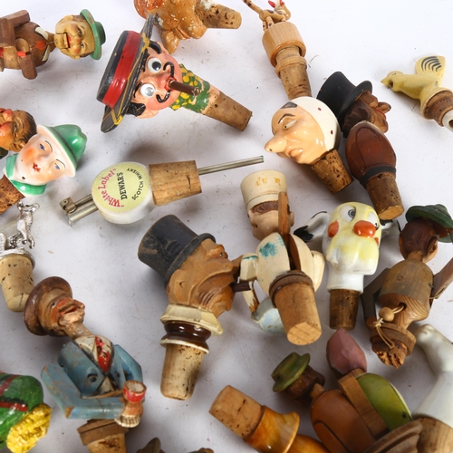 402 - A collection of Vintage novelty bottle stoppers/pourers