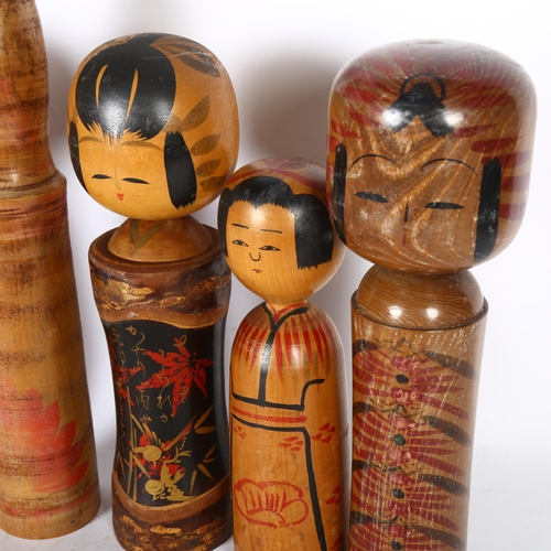 410 - A group of 6 Japanese painted wood Kokeshi dolls, tallest 44cm