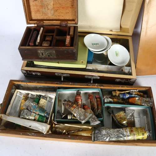 435 - Oriental paint box and contents, 39cm across, a small Chinese box with stencils, and a paint box wit... 