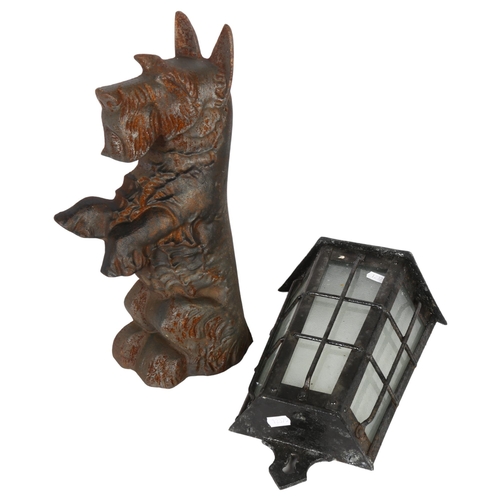 466 - A cast-iron Scottie dog doorstop, 38cm, and a porch light