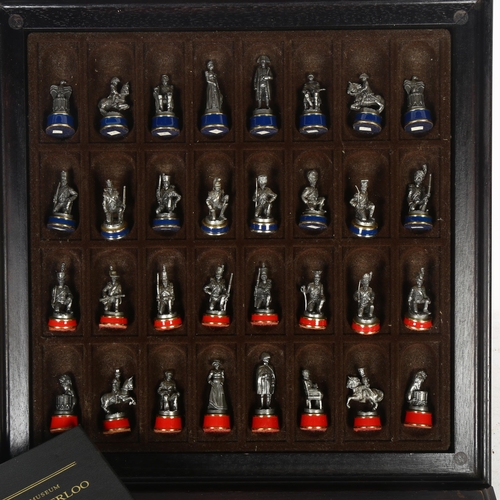 471 - A Battle of Waterloo chess set, produced by the Waterloo Museum, chess board 34cm across