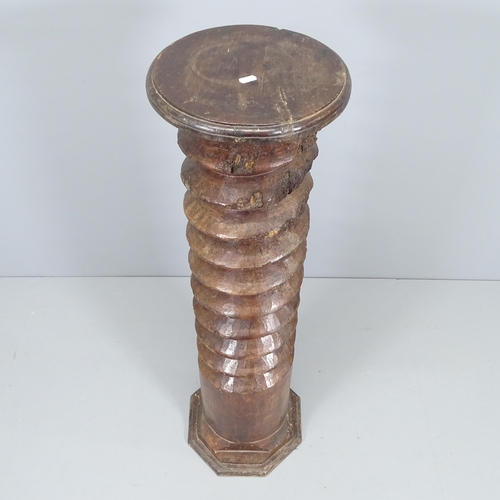 2199 - A French elm spiral turned column with circular top, on octagonal base. 30x110cm.