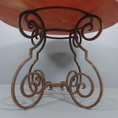 2201 - A late 20th century painted table on wrought iron base, in the Hollywood Regency manner, the top fin... 