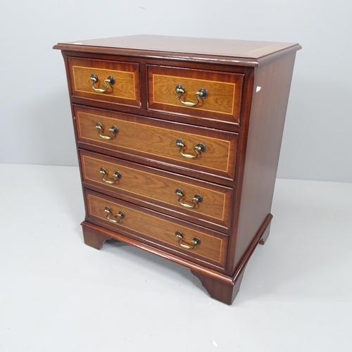 2206 - A reproduction mahogany chest of two short and three long drawers. 52x73x44cm