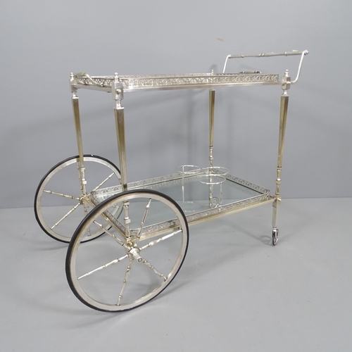 2209 - A mid-century French chrome and glass two-tier drinks trolley in the manner of Maison Bagues. 90x75x... 