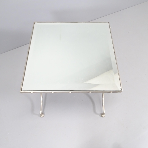 2214 - A mid-century Hollywood Regency design coffee table with plated metal frame and mirrored glass. 52x5... 